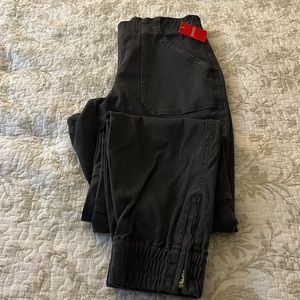 Black Spanx Cargo pants with zipper around ankles